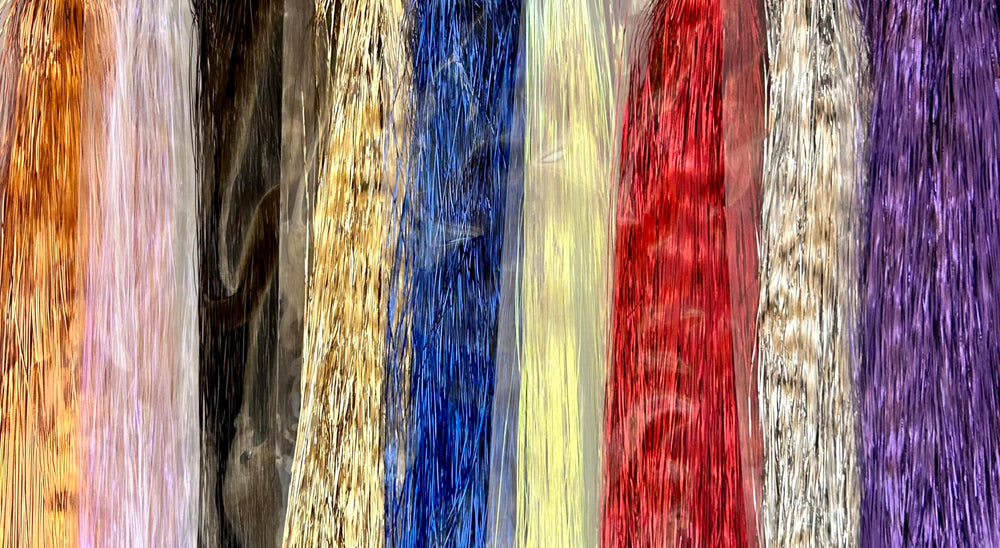 Circle B Tackle metallic tinsel Flashabou in purple enhances water movement.