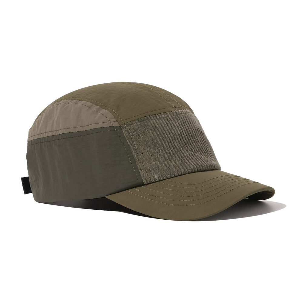Front view highlighting nylon body and corduroy forehead panel