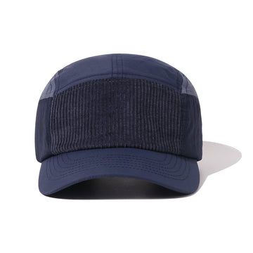Close-up of waterproof nylon fabric and curved brim