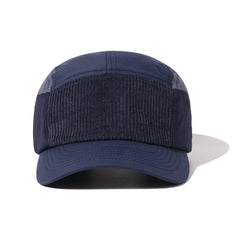 Close-up of waterproof nylon fabric and curved brim