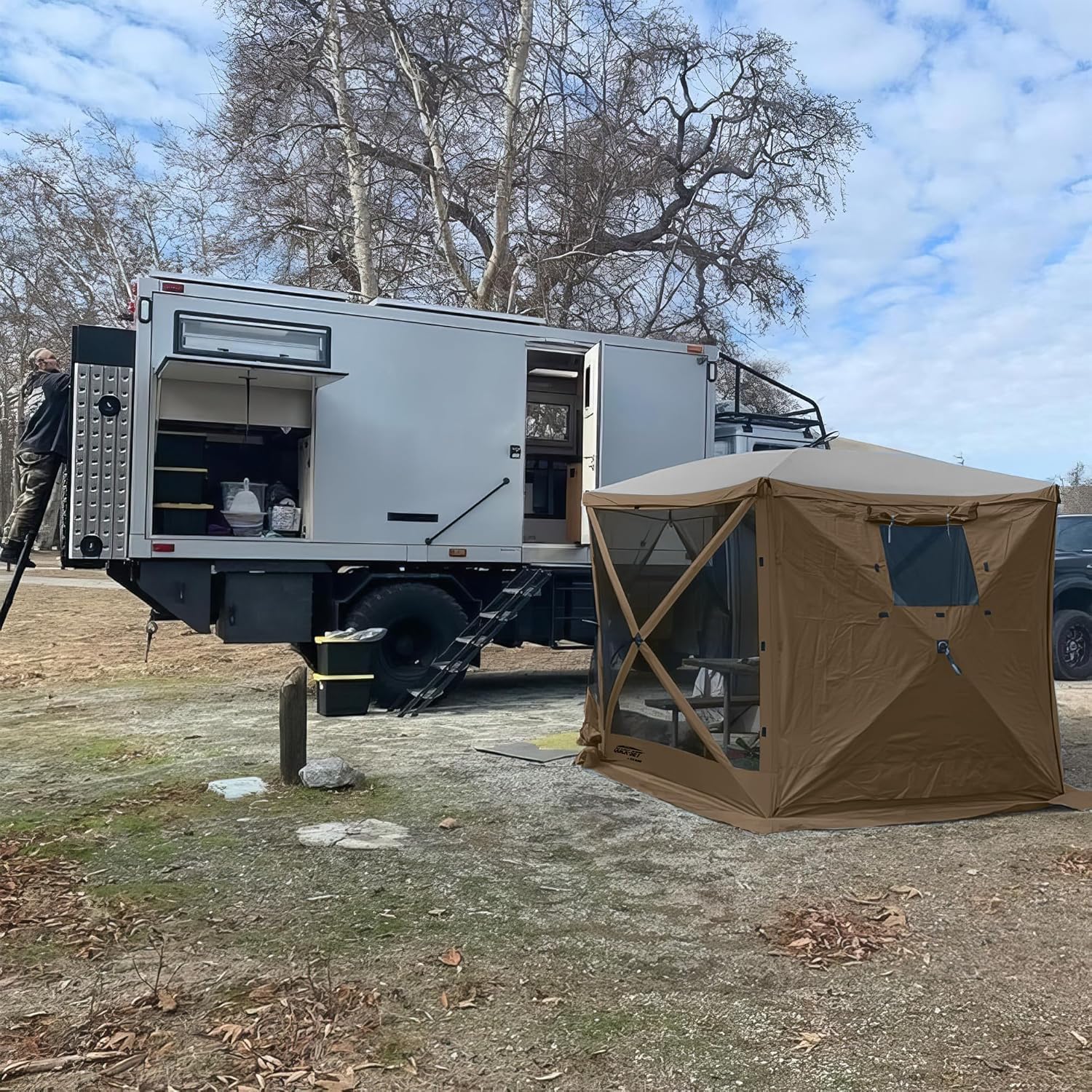 CLAM wind panels provide privacy and shade at outdoor events.