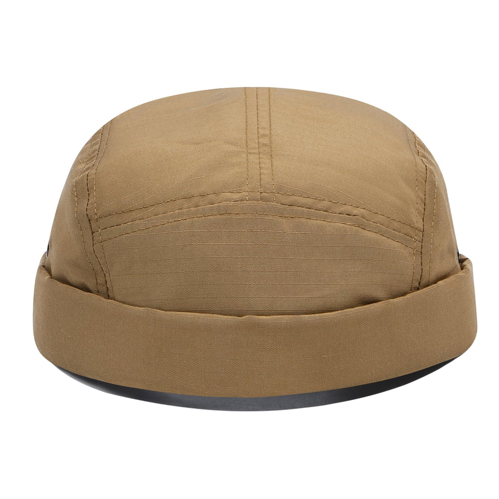 Lifestyle shot of CLAPE brimless cap in outdoor setting