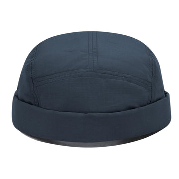Packable brimless cap suitable for travel