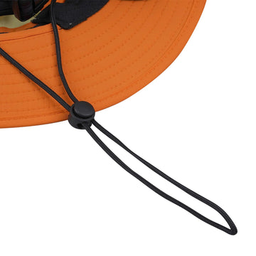 Lightweight breathable CLAPE Surf Hat on a sandy beach