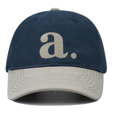 Two-tone color-block design with embroidery close-up