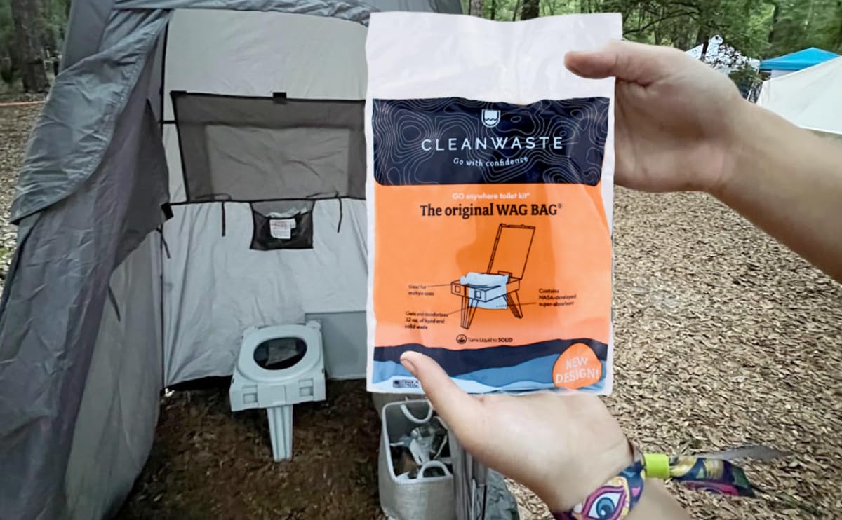 Cleanwaste GO Anywhere toilet folds for easy carrying with handle.