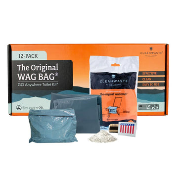 Cleanwaste Original WAG Bag kit contents spread for camping use, highlighting portability.
