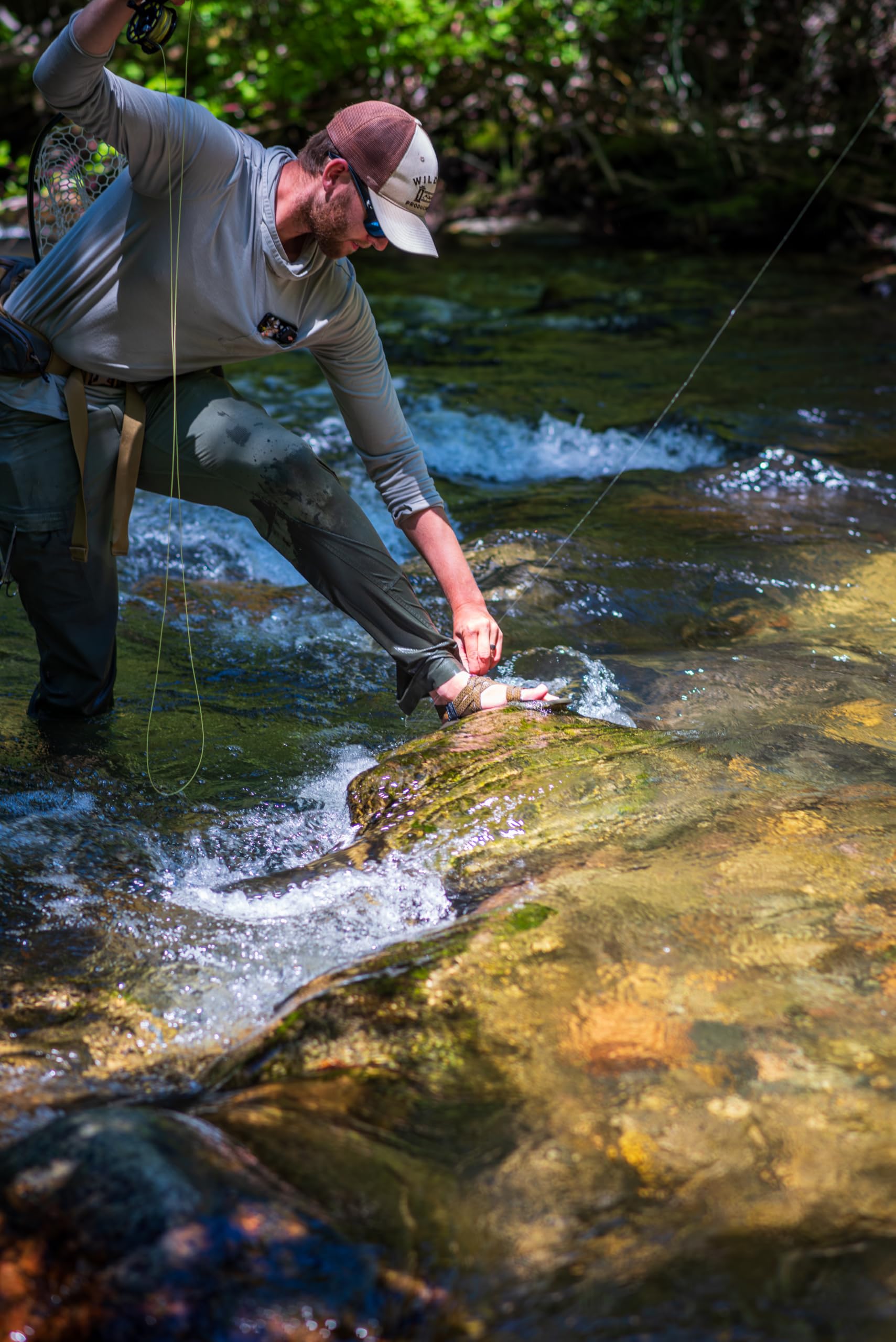 Cling Fishing Products Mag Grab Doublestack mounted on wader strap for quick access.