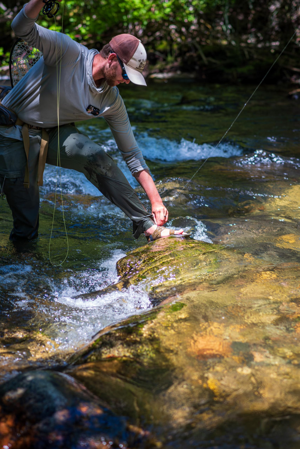 Cling Fishing Products Mag Grab Doublestack mounted on wader strap for quick access.