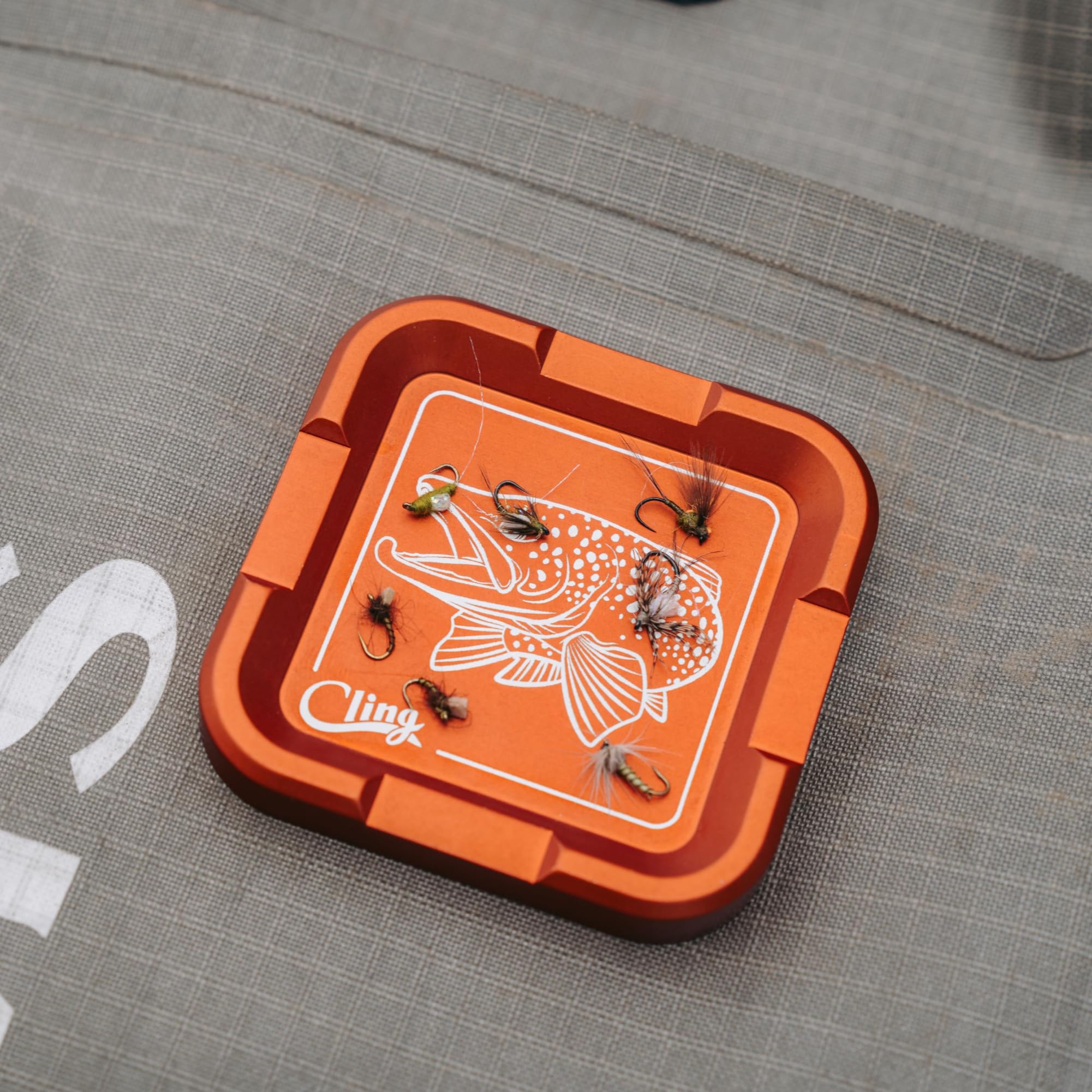 Cling Fishing Mag Grab Plus four magnets closeup showing strong magnetic fly organization option.
