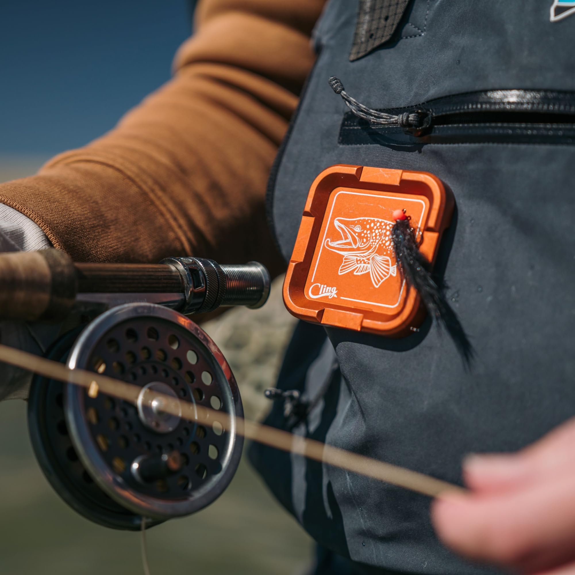 Cling Fishing Mag Grab Plus worn on vest demonstrates hands-free fly patch storage during casting.