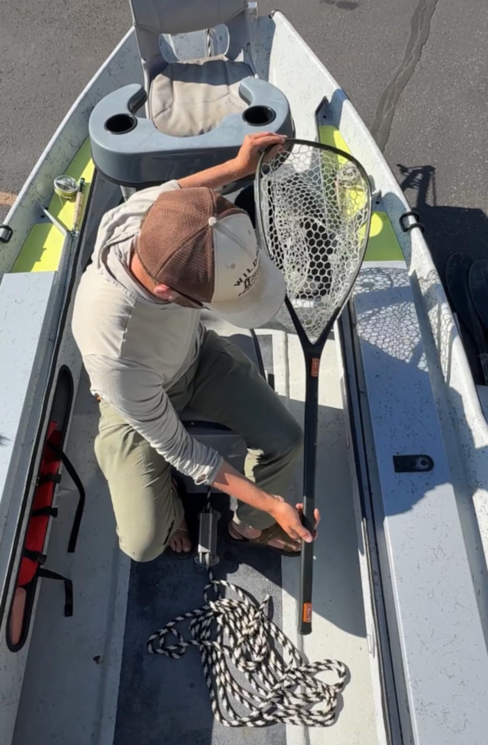 Cling Mag Grab Net Rack on kayak provides organized gear within arm's reach.