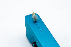 Cling Mag Grab Rod Rack blue attached to strap secures rods during quick lure swaps