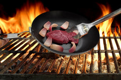 CNEIESD carbon steel skillet, 9.5 inches, delivers even heat for searing outdoors