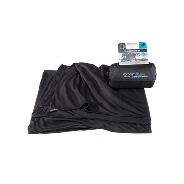 COCOON Coolmax travel blanket folded compactly for easy packing on trips