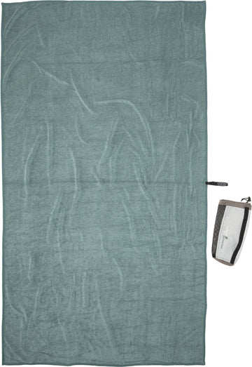 COCOON Eco Trek Towel Nile Green XL packed in a recycled sack for eco-friendly travel