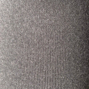 COCOON Premium Coolmax Travel Blanket charcoal on plane provides cozy warmth during flights