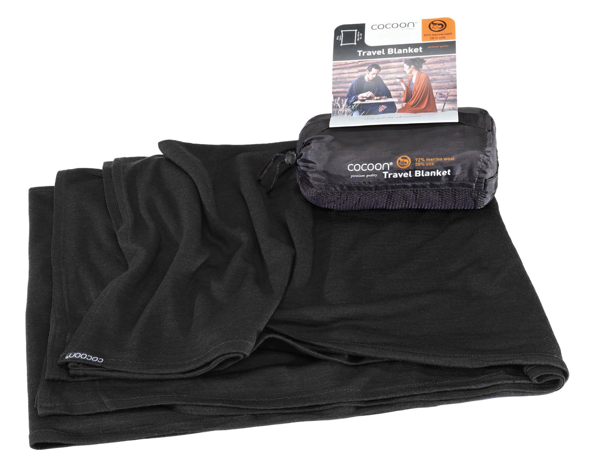 Cocoon travel blanket folded in its compact stuff sack for easy packing.