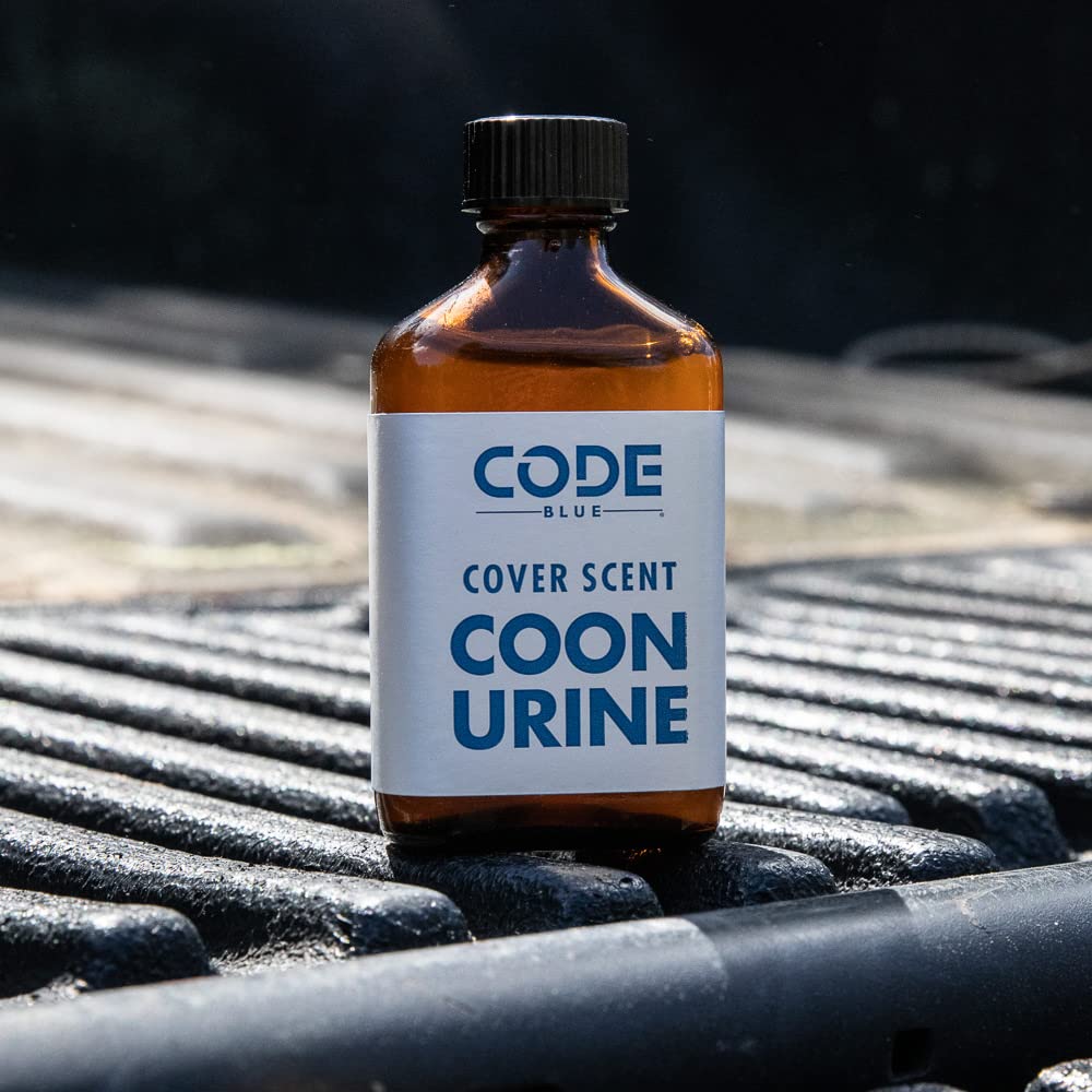 Code Blue Coon Urine 2-ounce bottle ready for field use.