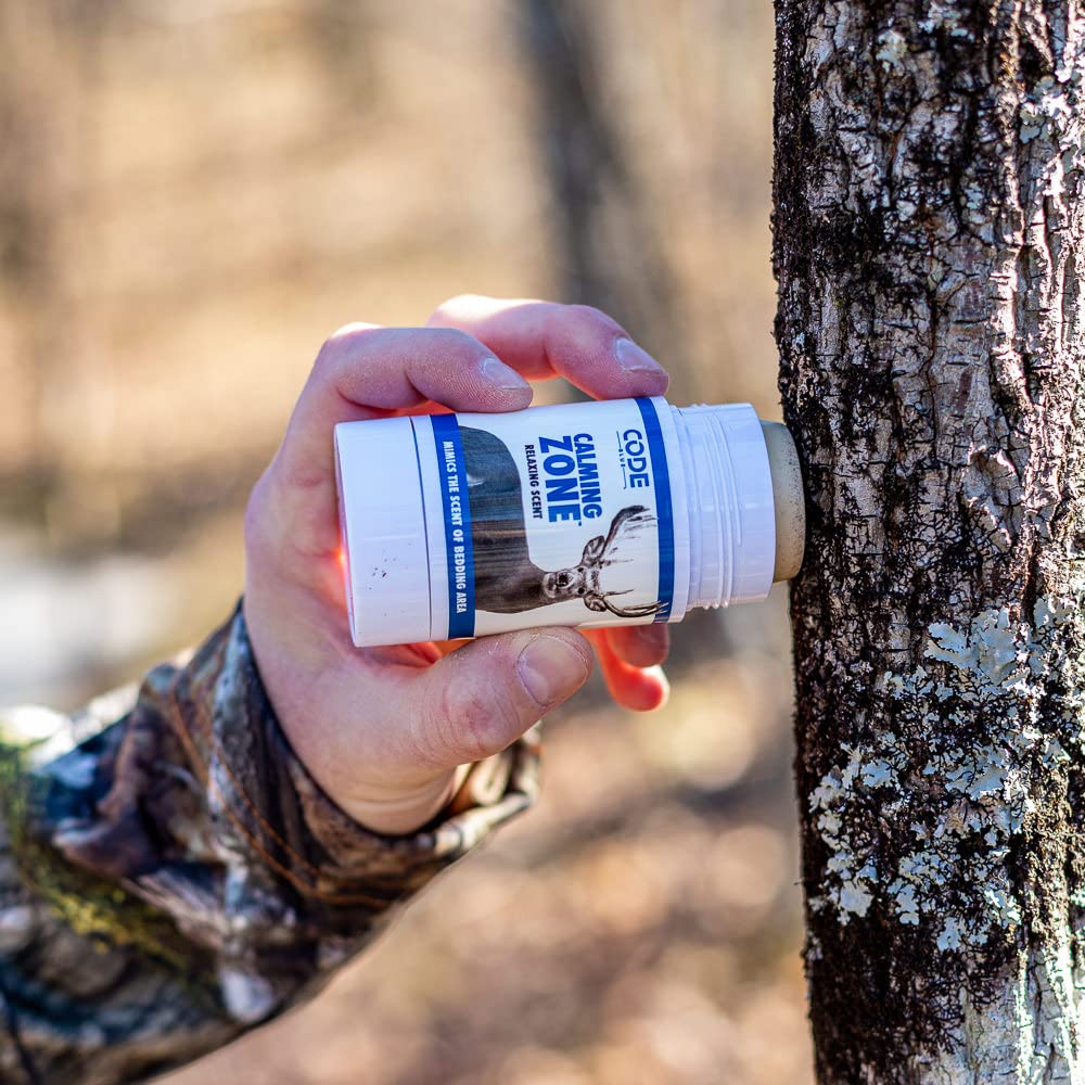 Code Blue Calming Zone scent stick on brush ready for deer scenting.
