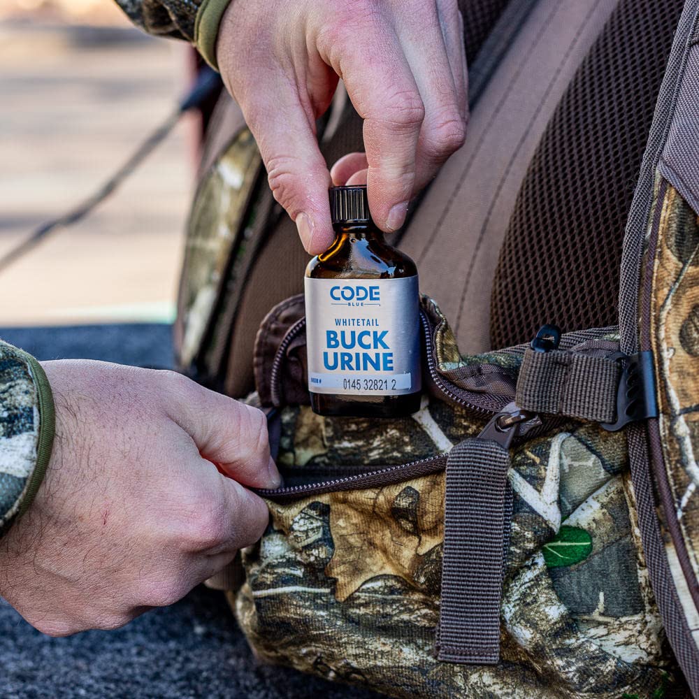 Code Blue Whitetail Buck Urine label shows unique registration number for quality tracking.