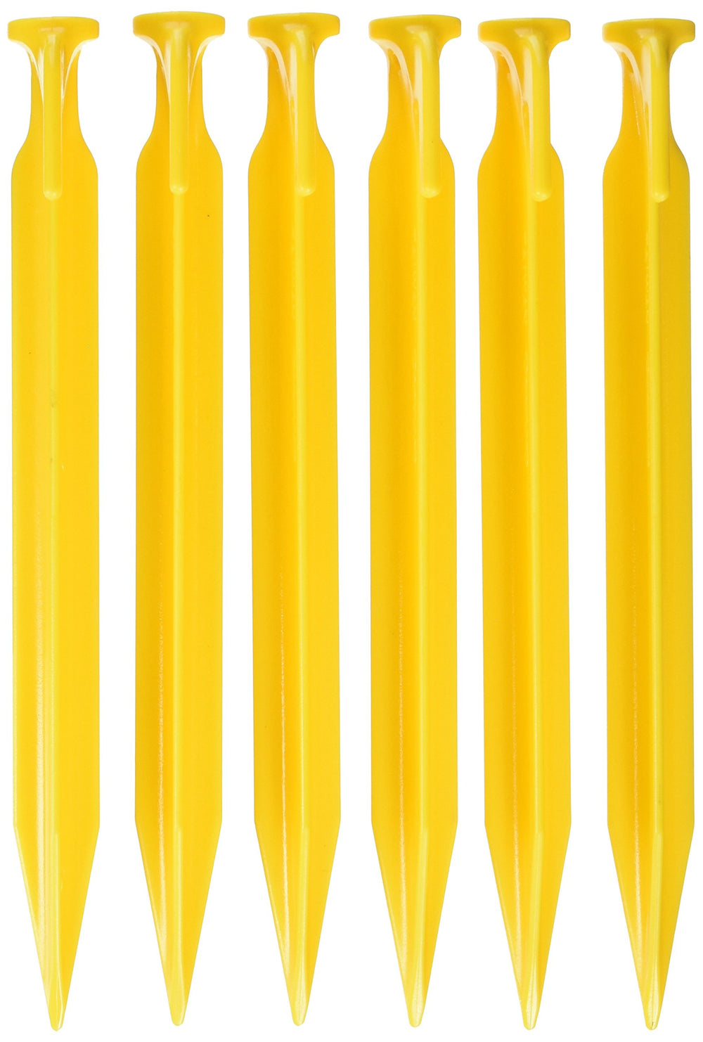 Coghlan's 9-inch ABS tent pegs anchored in soil for secure camping setup
