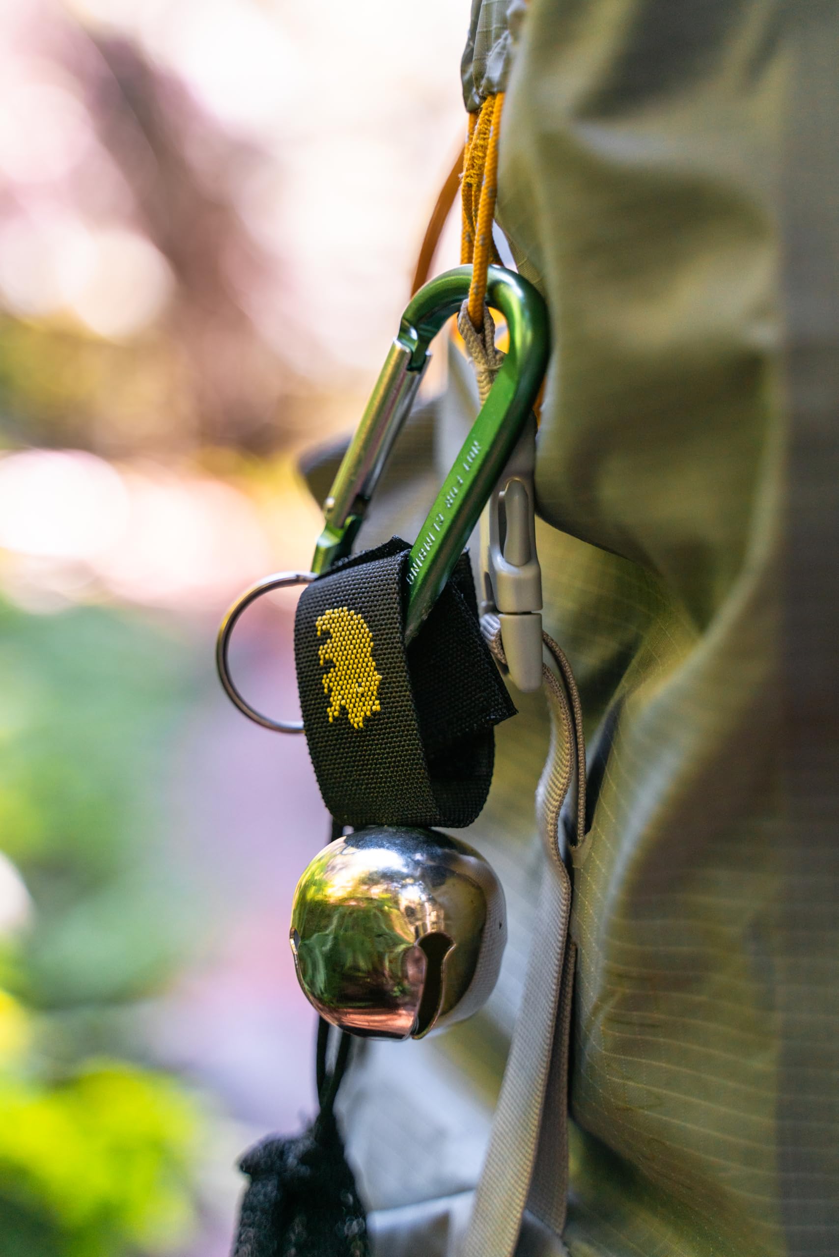 Coghlan's Bear Bell closeup shows magnet and silencer detail