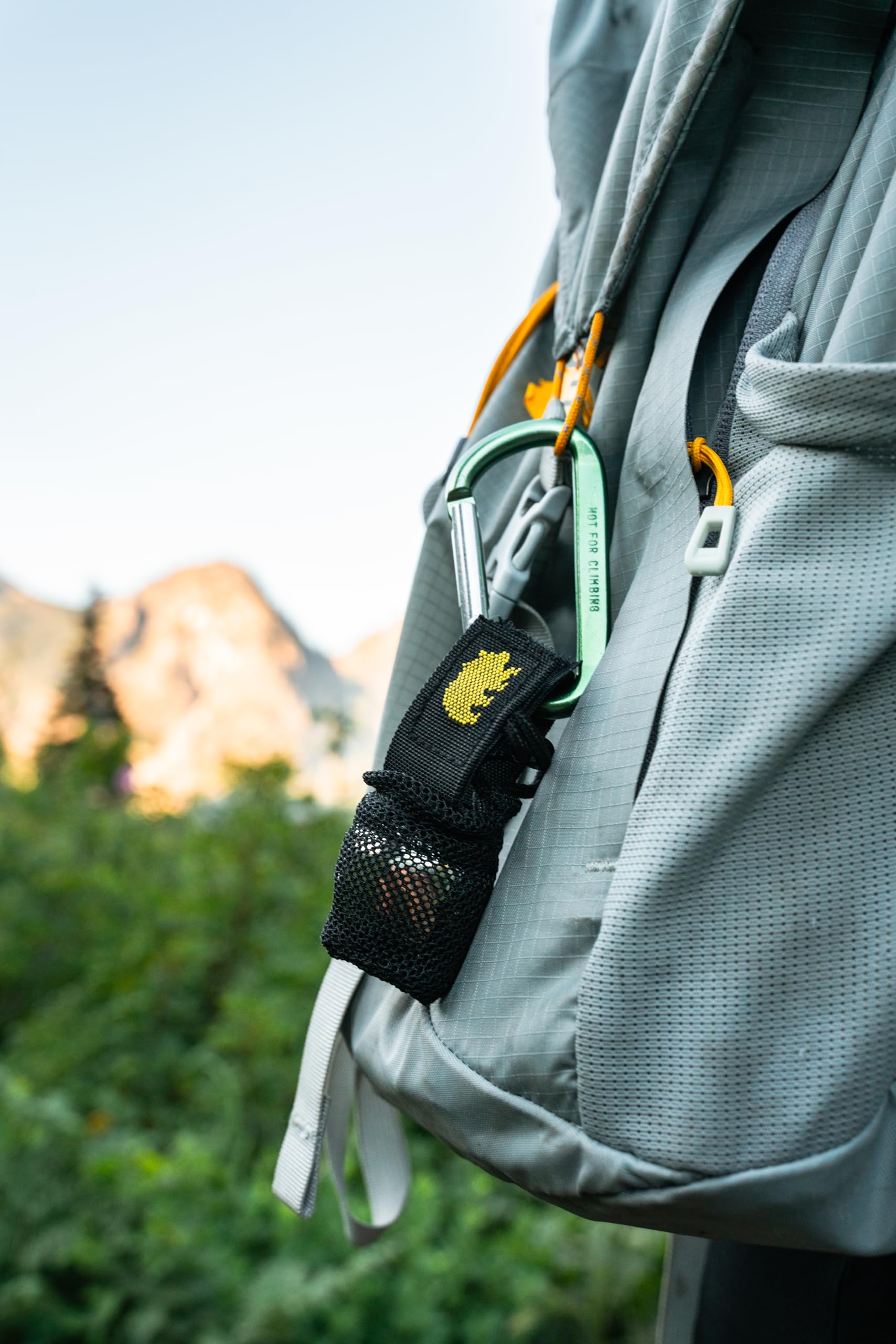 Coghlan's Bear Bell on boot adds lightweight awareness on uneven terrain