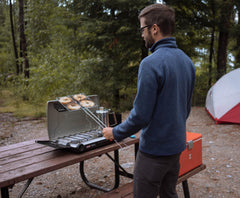 Coghlan's Broiler 8x9-inch grill surface fits burgers and vegetables on the go.