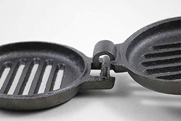 Coghlan's broiler showing double cooking surface for efficient camp grilling