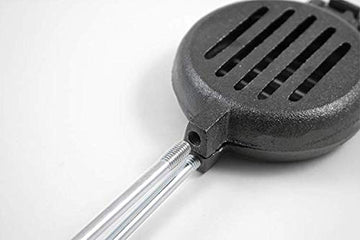 Coghlan's cast iron broiler with removable wooden handles for safe, portable packing