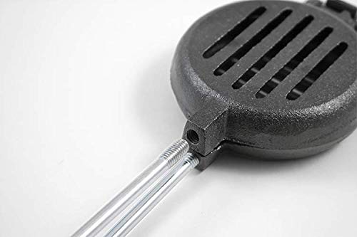 Coghlan's cast iron broiler with removable wooden handles for safe, portable packing