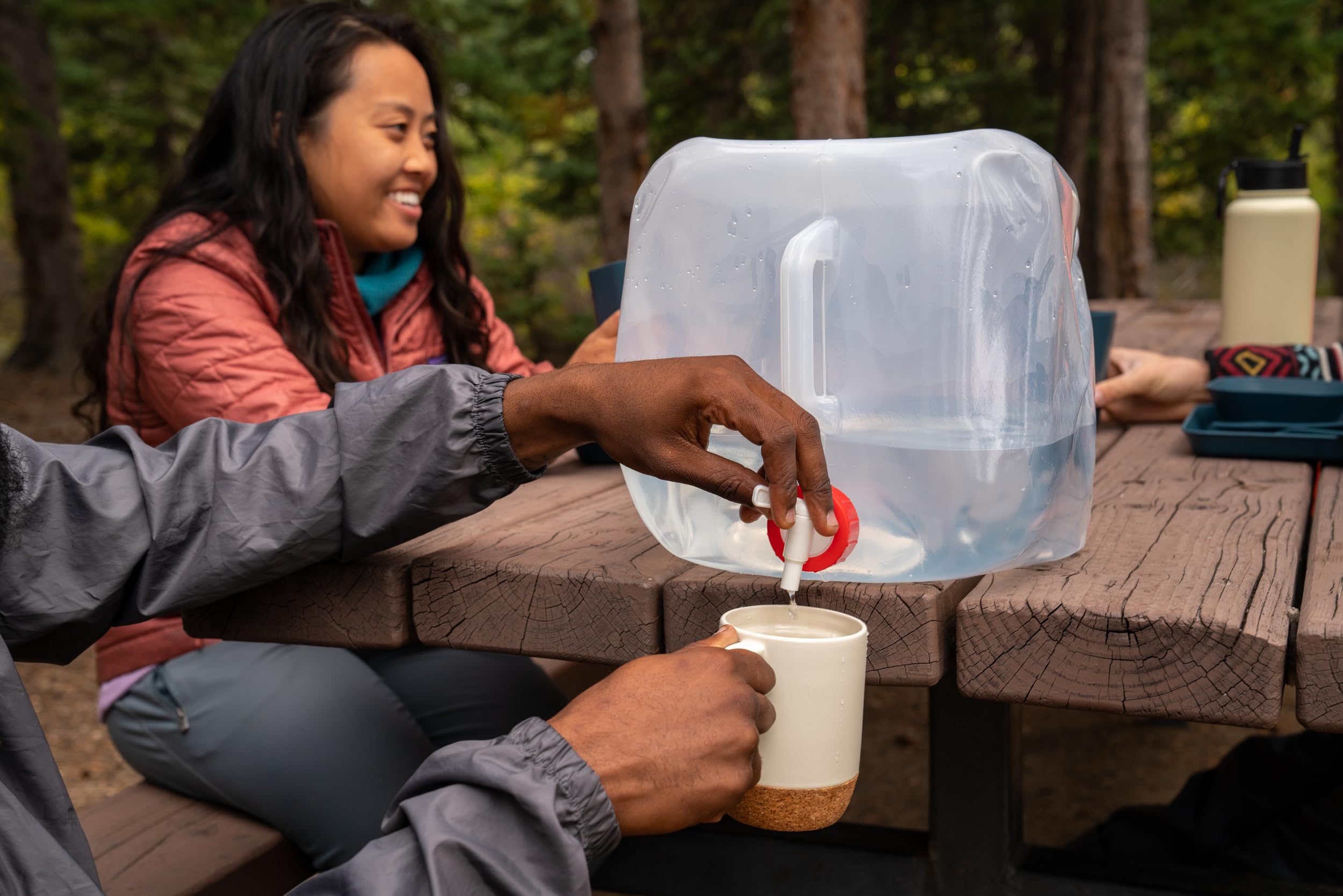 Coghlan's collapsible water container folded empty fits in a backpack