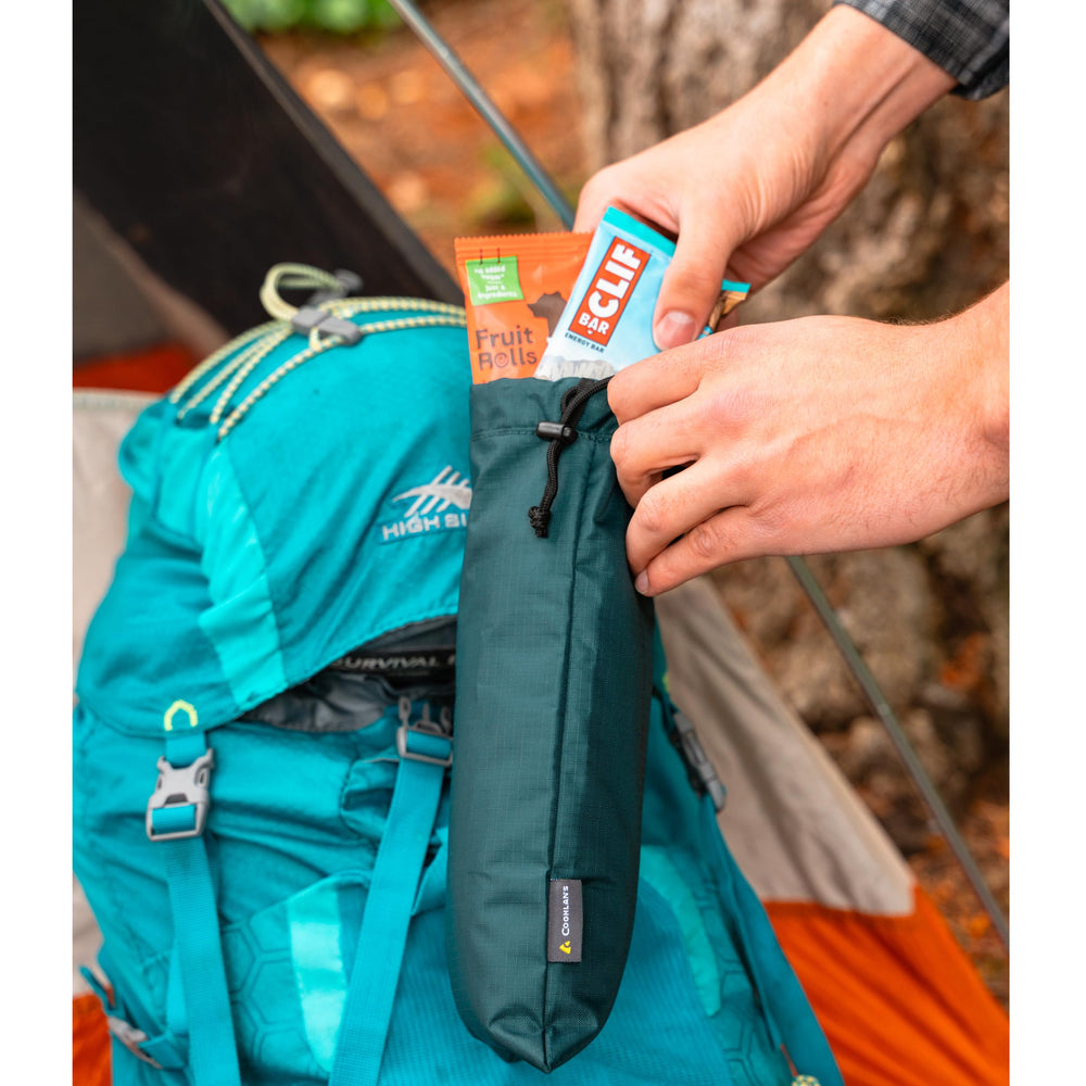 Coghlan's 4L ditty bag holds stove parts or outerwear while staying protected.