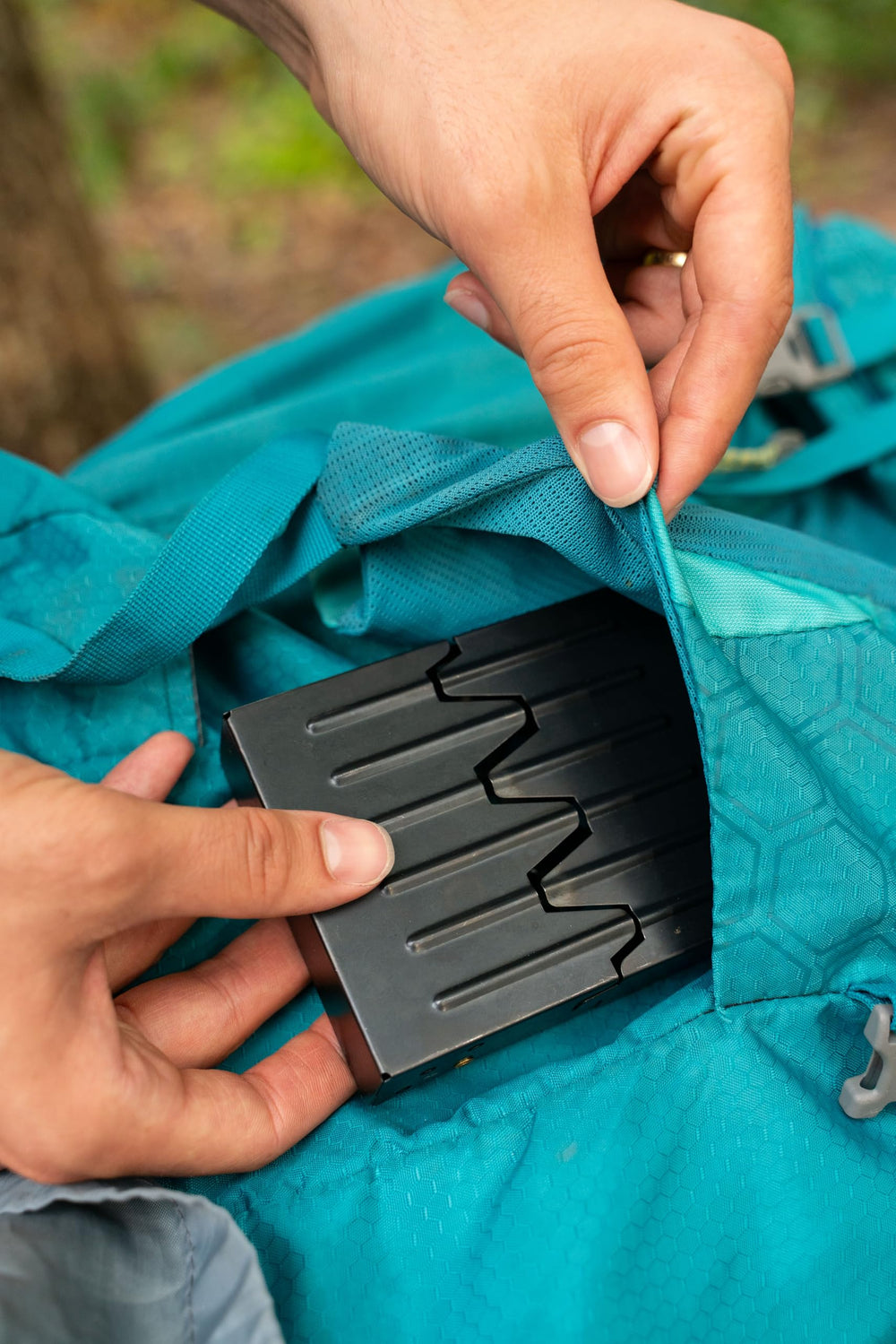 Coghlan's Emergency Stove compact in a daypack for travel