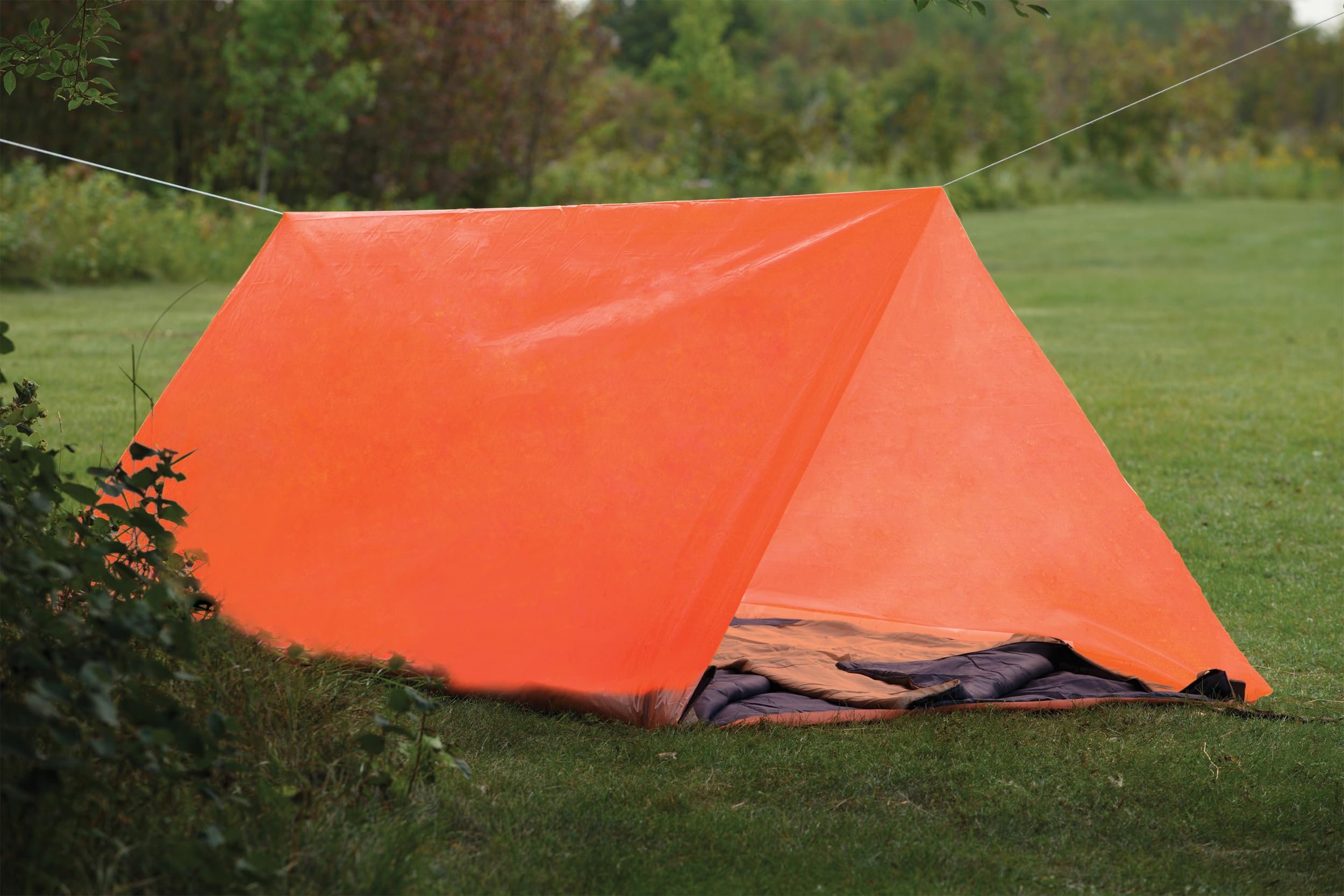 Coghlan's emergency tube tent setup in minutes for quick shelter on hikes.