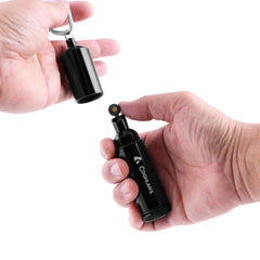 Carabiner attachment keeps Coghlans firestarter accessible on gear.