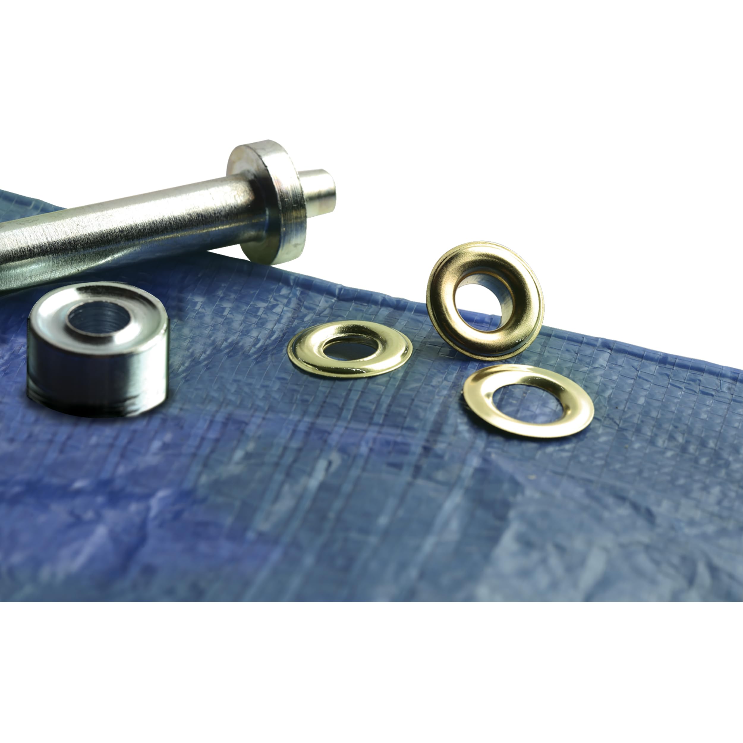 Coghlan's grommet kit in use on a tent for quick field repairs.