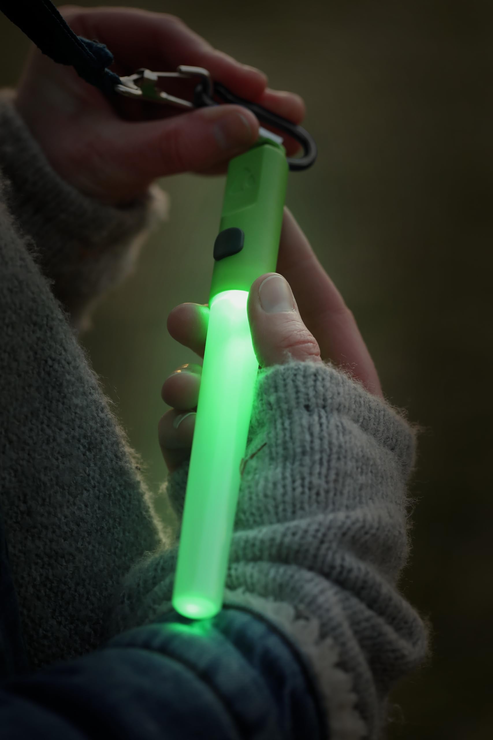 Coghlan's LED Lightstick Green tent campsite setup illumination in use.