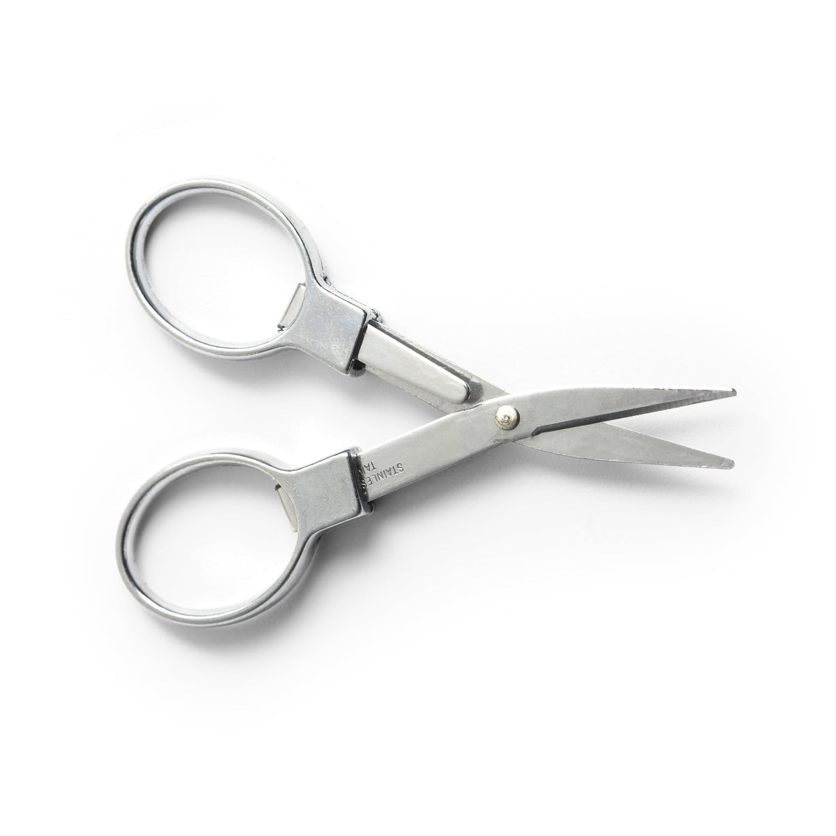 Coghlan's stainless steel folding scissors folded compact for travel and storage