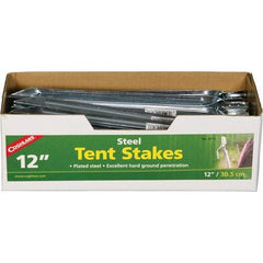 Coghlan's steel tent stake 12in secures tents on varied soil for reliable camping setups.