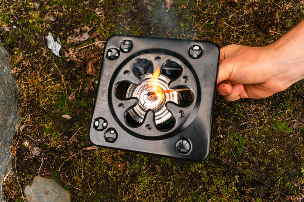 Coghlan's stove fits small to medium cookware for boiling and warming meals.