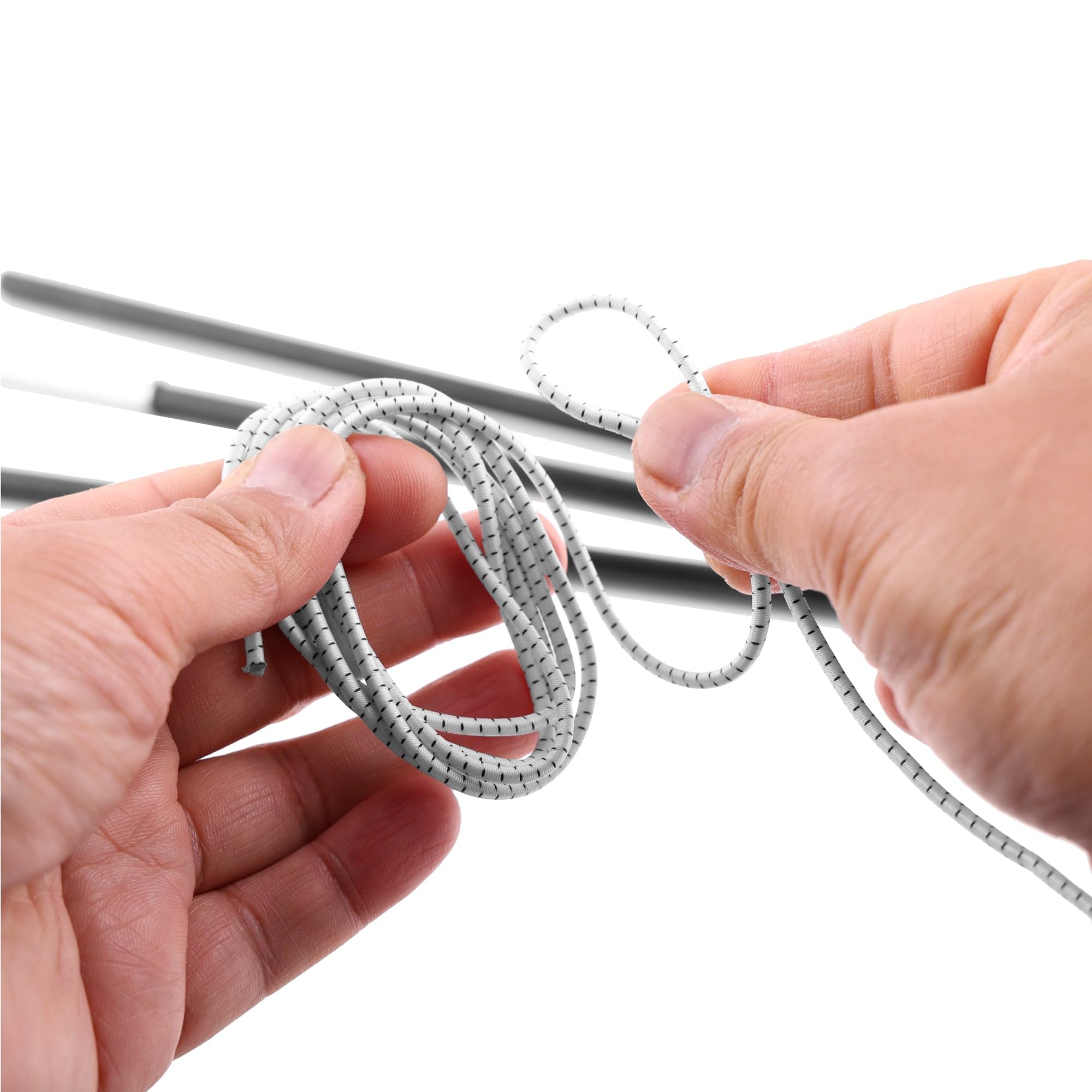 Coghlan's shock cord in use during tent pole repair for stability.