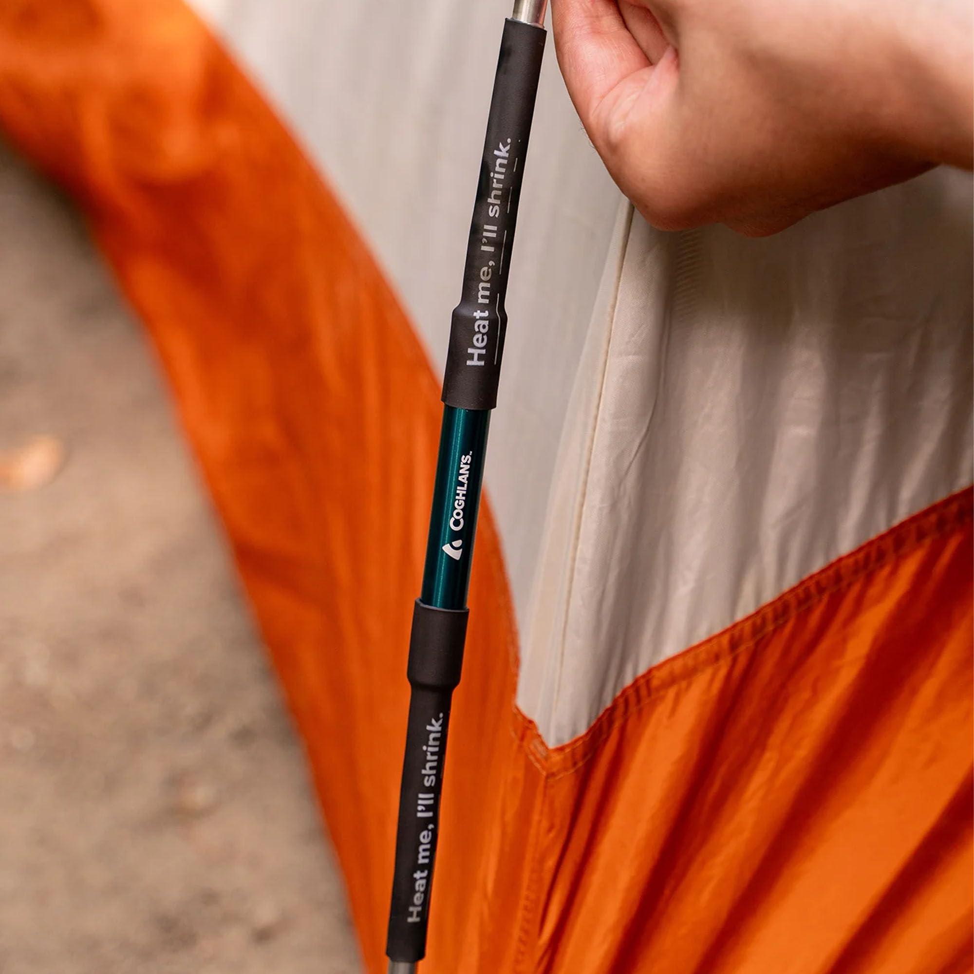 Coghlan's tent pole repair kit in use during camping setup