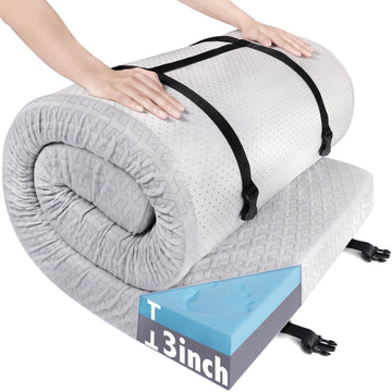 Coldwind memory-foam camping mattress pad rolled for travel and easy packing.