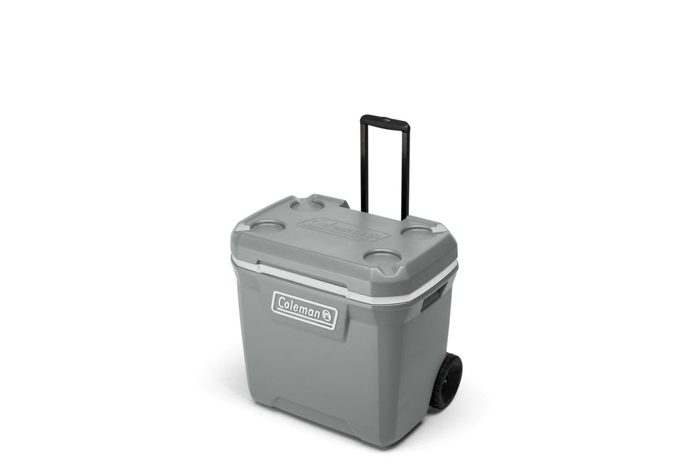Coleman 316 Series 65-Quart wheeled cooler outdoors for easy transport