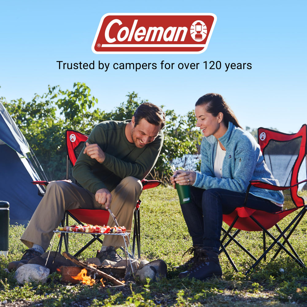 Coleman Broadband Mesh Quad Chair in use at camping or tailgating event