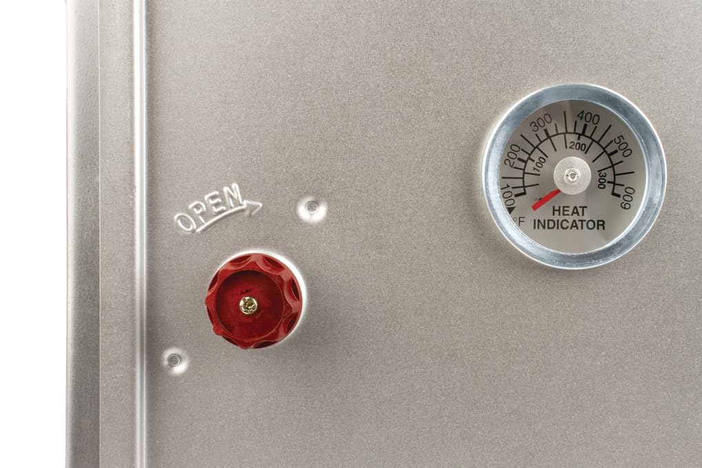 Coleman Camp Oven Silver open-lid view enables quick checks.
