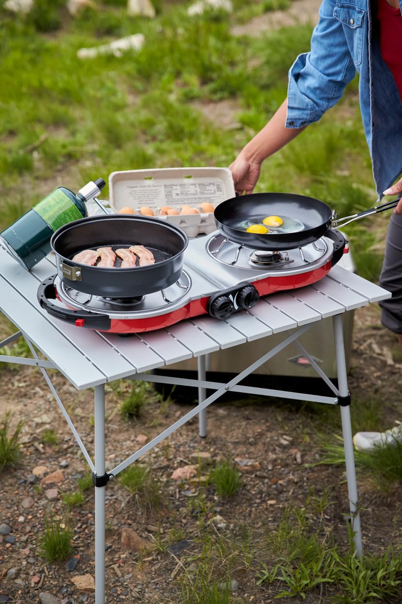 Coleman Fold N Go stove chrome-plated removable grates for easy cleaning.