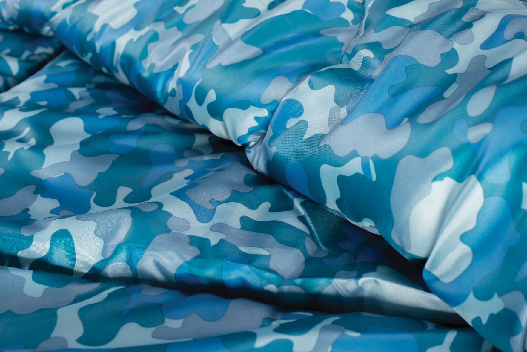 Coleman Kids Camo zipper close-up, ZipPlow prevents snags during opening and closing